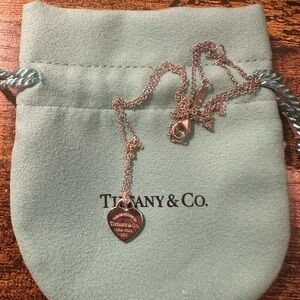 Tiffany & Co. mini heart tag pendant in sterling silver with a diamond